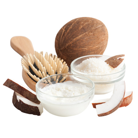 Natural hair treatment with coconut butter. Spa set with brush isolated on whiteの写真素材