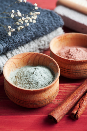 Red and blue cosmetic moroccan clay powder, spa composition with copy spaceの写真素材