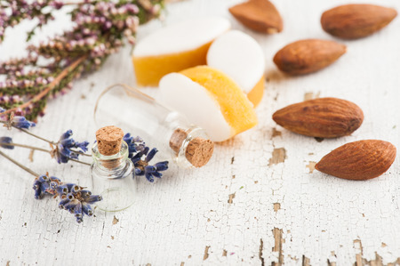 Almonds and calissons with rustic decor, lavender flowers on wooden tableの写真素材