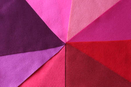 Background from different color triangles felt. Abstract composition in bright colors.の写真素材
