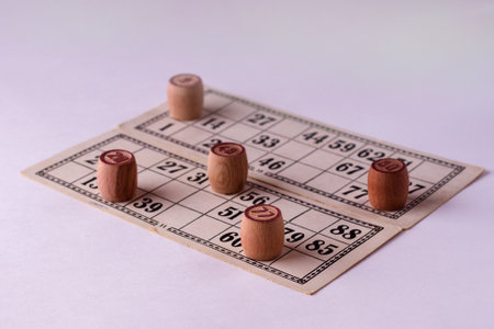 barrels with lotto and game cards on a light background. bingoの写真素材