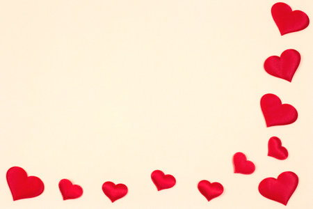 Valentine's day background. Red hearts on a pink background. Valentine's day concept. Flat lounger, top view, copy spaceの写真素材