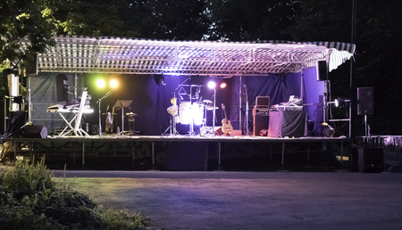 A scene prepared for a musical group for a night concert.の写真素材