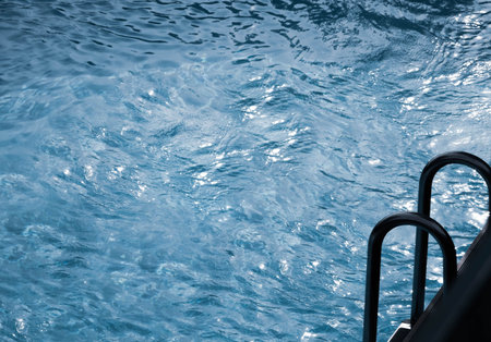 Descent into the pool with light blue water with highlights
