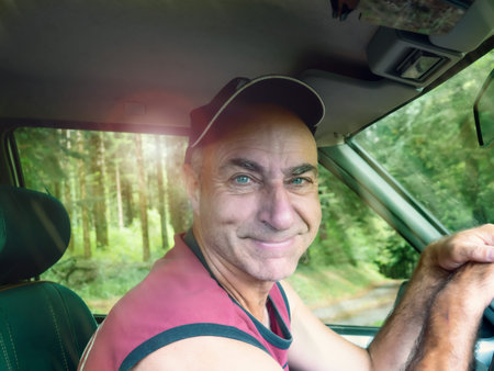 The driver behind the wheel invites the passenger to his car.