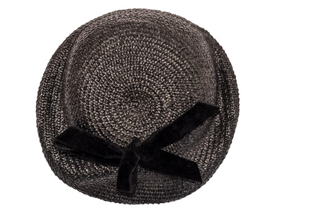 Black female hat with brim and bow vintage fashion of the early twentieth century isolated on white background. Top view.の写真素材