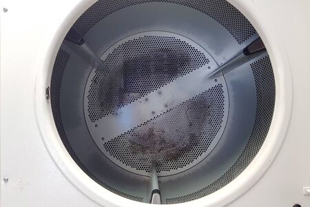 Empty clean tank of automatic laundry dryer.の写真素材