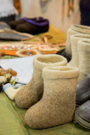 Valenki- Traditional small kids russian gray felt boots on trade counterの写真素材