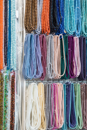 Colorful Beads. String of beads in various colors. Colorful beads necklaces. Handicraft fashionable for women.Gem Stone Ready to Prepare Handmade Jewelsの写真素材