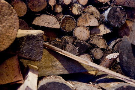 Big stack of firewood for warm and comfort