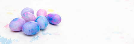 easter eggs. blue and pink Easter eggs top view. Beautiful Easter table setting composition. A row...
