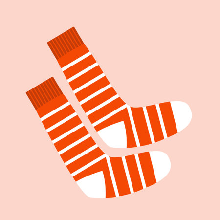 Vector illustration. Simple cute cartoon style socks. Cozy autumn or winter knitted wool socksのイラスト素材