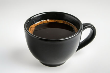 Black cup of coffee on a white backgroundの素材