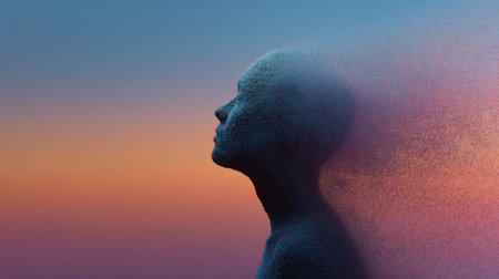Human silhouette dissolving into grains against a colorful sunset sky conveying themes of identity and transformationの素材
