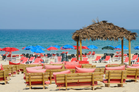 Sea and Beach bar with umbrellas, sunlightの写真素材