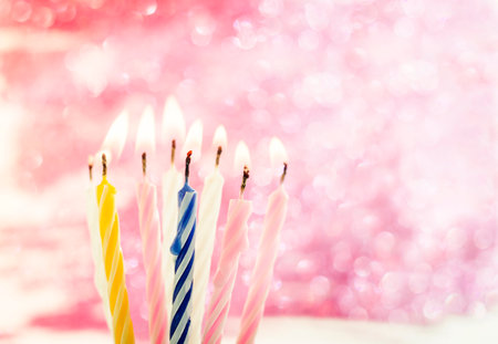 birthday candles on pink backgroundの写真素材