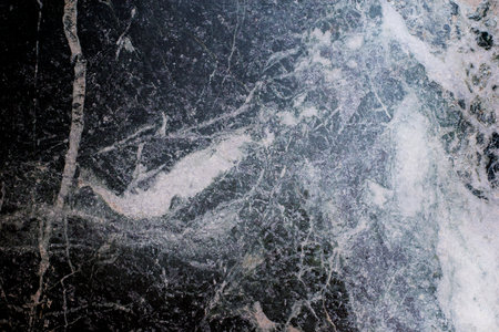 macro texture of gray stone with white stains. natural backgroundの写真素材