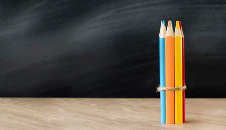 group of pencils on the background of the school board