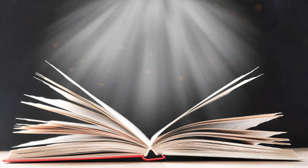 rays shine on an open bookの写真素材