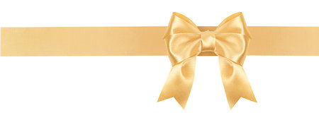 bow and satin ribbon golden color on white isolated backgroundの写真素材