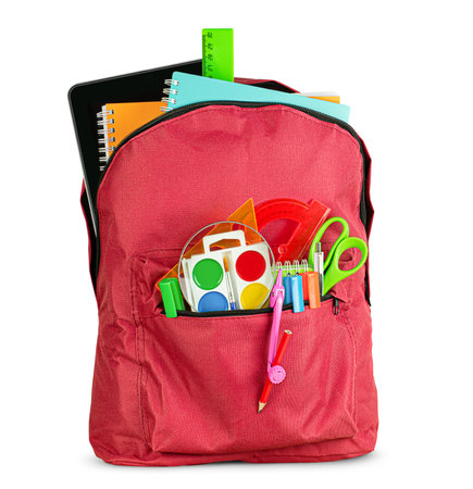 one red school backpack with digital tablet and stationery on isolated white backgroundの写真素材