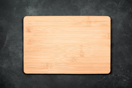 cutting board on black concrete background