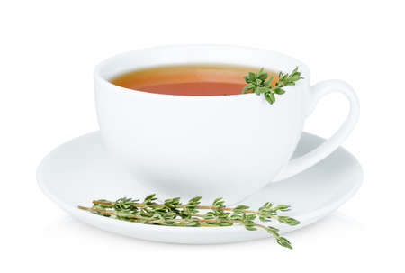 one white cup of tea with fresh thyme sprigs on isolated white backgroundの写真素材