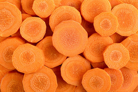 background of fresh sliced carrots close-up