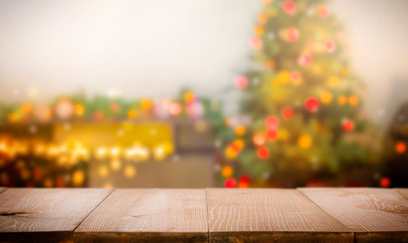 empty wooden table and defocused christmas room in the background