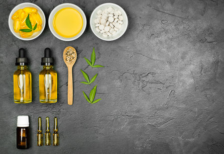 cannabis products and CBD Oil On a dark concrete backgroundの写真素材
