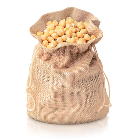 chickpeas in burlap sack on white isolated backgroundの写真素材