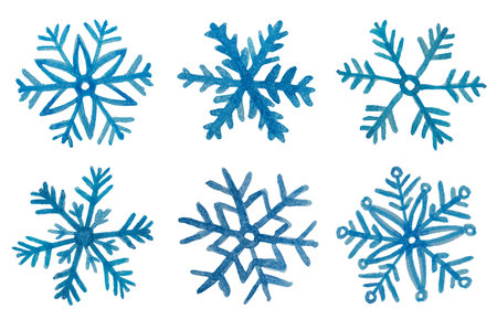 six snowflakes drawn with watercolor blue paint on a white isolated backgroundの写真素材