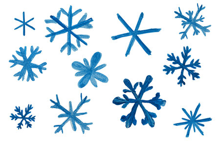 collection of blue snowflakes drawn with watercolor paint on a white isolated backgroundの写真素材
