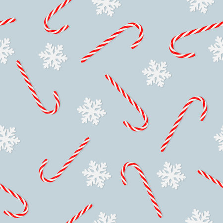 seamless pattern of candy cane and snowflakes on a blue backgroundの写真素材