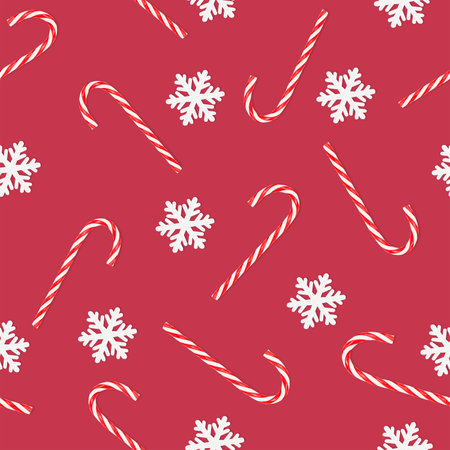 Christmas seamless pattern of candy cane and snowflakes on a red backgroundの写真素材