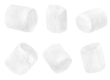 six marshmallows from different angles on a white isolated backgroundの写真素材