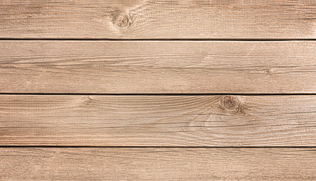 background wooden texture of hard knotty woodの写真素材