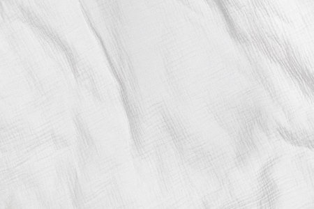 background of delicate white muslin fabricの写真素材