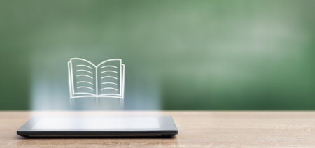 digital tablet with book hologram and copy space. education conceptの写真素材