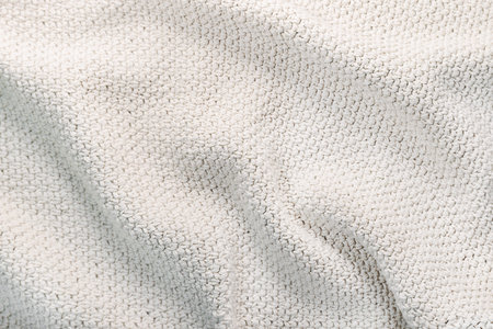 background knitted warm blanket with folds