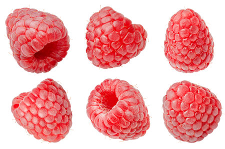 A collection of raspberries, extremely close-up, on a white isolated background