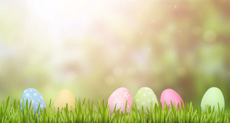 Easter eggs in the grass on a blurred nature background