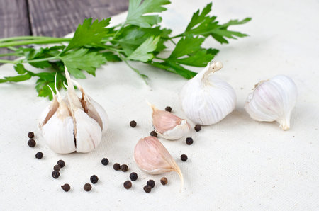 garlic, allspice and sprigs of fresh parsleyの写真素材