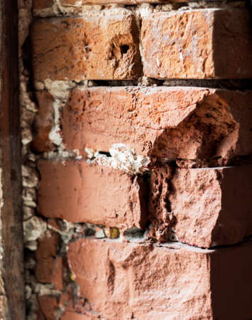 Old worn old brick wall in grunge style, The textured background. Photo pattern.の写真素材
