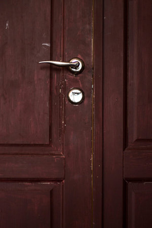 brown door with a lock. she closedの写真素材