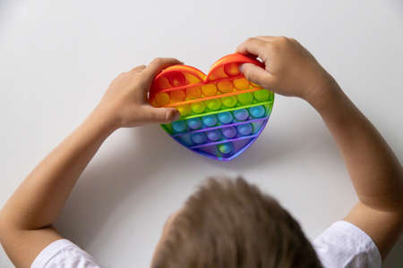 Popular New Fashionable Toy Bubbles Fidget Popping toy for children and people with stress. Rainbow Popping Bubble Touch Toy For Kidsの写真素材