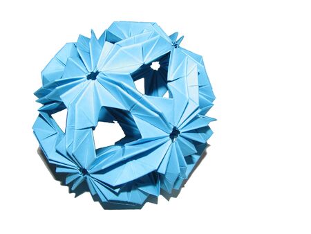 Isolated blue paper origami kusudama shape of sphere with shadow on white backgroundの写真素材