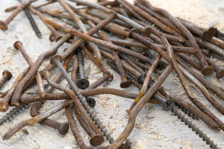 Background of many and screws. The concept of construction, woodwork, carpentry