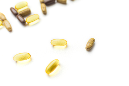 Assorted pharmaceutical medicine pills over white backgroundの写真素材