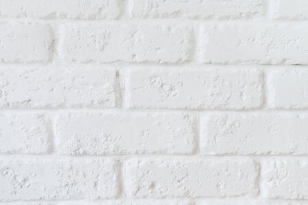 Kitchen wallpaper concept: Close up modern white brick tiles wall texture background. White brick wall textureの写真素材